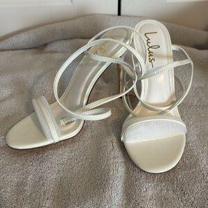 Beautiful off white strappy heels by Lulus in size 8 1/2